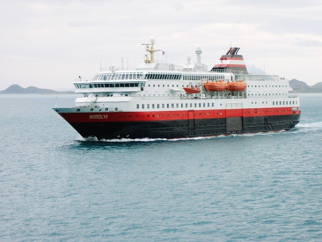 The M/S Nordlys, one of the other 10 coastal ships, passing us on its way South.