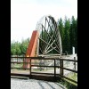 A large, slowly rotating waterwheel near Grngesberg.