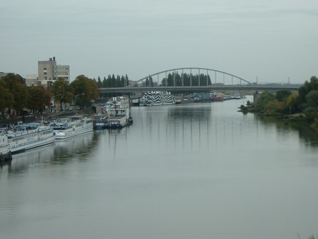 The view from the bridge in Arnhem. I've seen a picture of that zebra-like boat in a book. The disru...