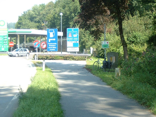 The bike has now crossed into Austria, which means it gets a new style of cycleway sign to lean agai...