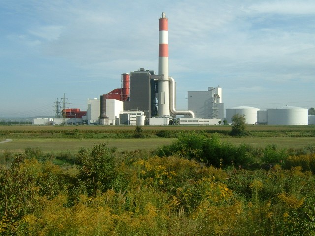 Heavy industry near the riverbank.
