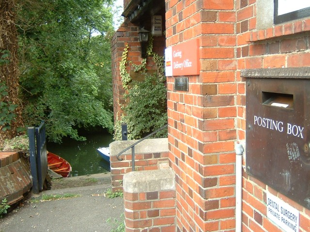 A rather quaint little Post Office in Goring, with the River Thames beyond it.