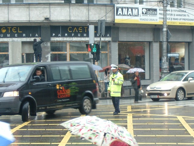 I saw traffic signals like these in places from Budapest to Istanbul. People crossing the road on th...