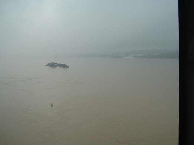 This will be the last time I see the Danube. It's become very wide now. In the middle there are thre...