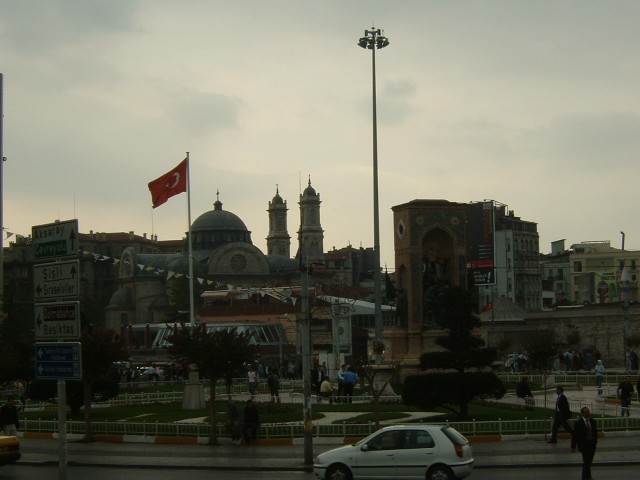 Taksim Square, at the heart of the modern business district of Istanbul. It's a big mess of buses an...