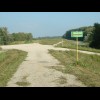 Can you tell which way the cycle route goes here? The marking is in yellow paint in the middle of th...