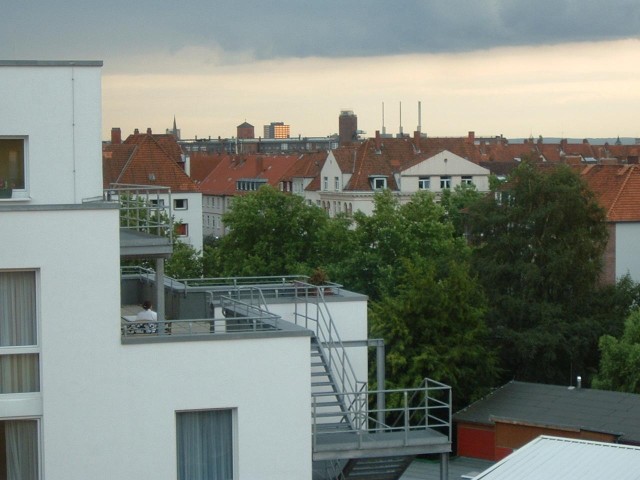 The view from my window in Hannover. I just liked the way the Sun was reflecting off that building i...