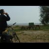 Contemplating the rather large country which lies on the other side of the lake.