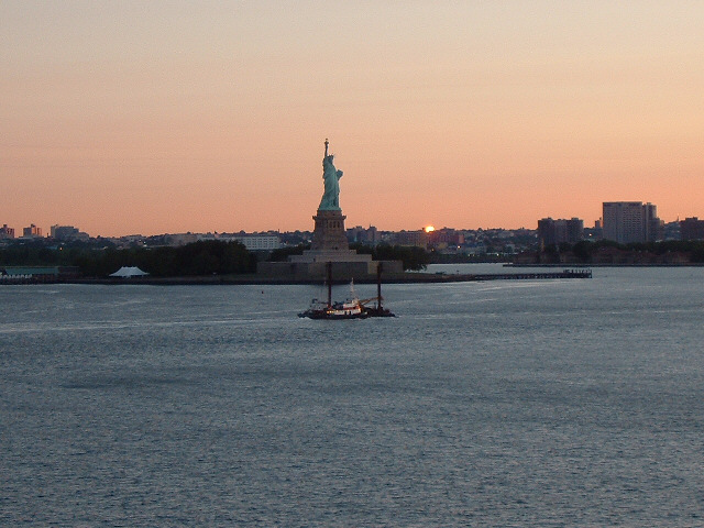 Apparently there's another sun coming up in the west. Maybe it's a reflection.