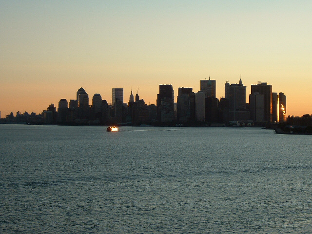 Manhattan again, with one of the Staten Island ferries glinting in the sun.