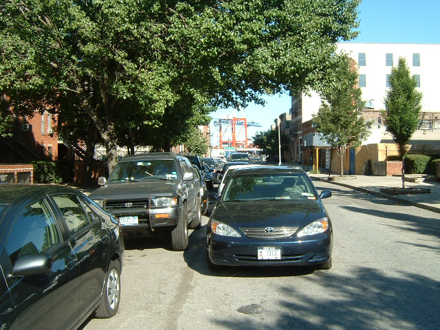 Interesting parking. How do the cars nearest the kerb get out?