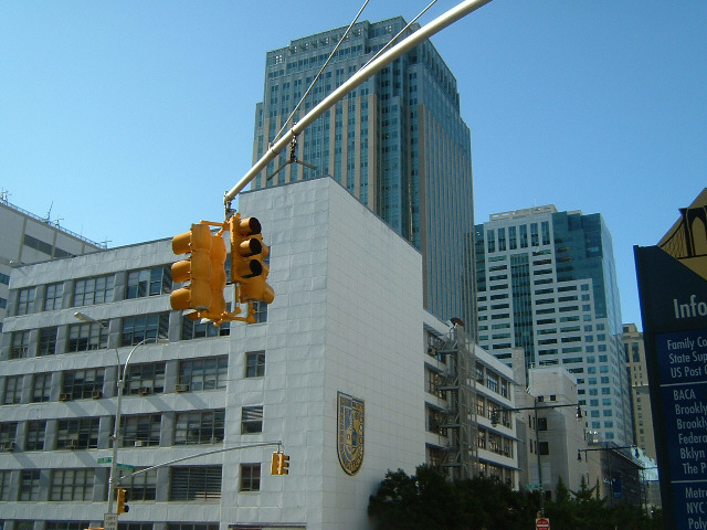 Definitely America. The white building is New York Technical College.