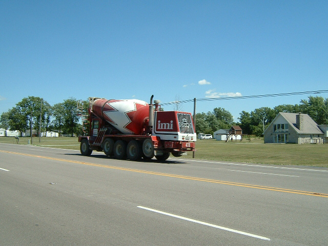 This is how cement mixers look in America: back to front. This one is travelling to the left. I have...
