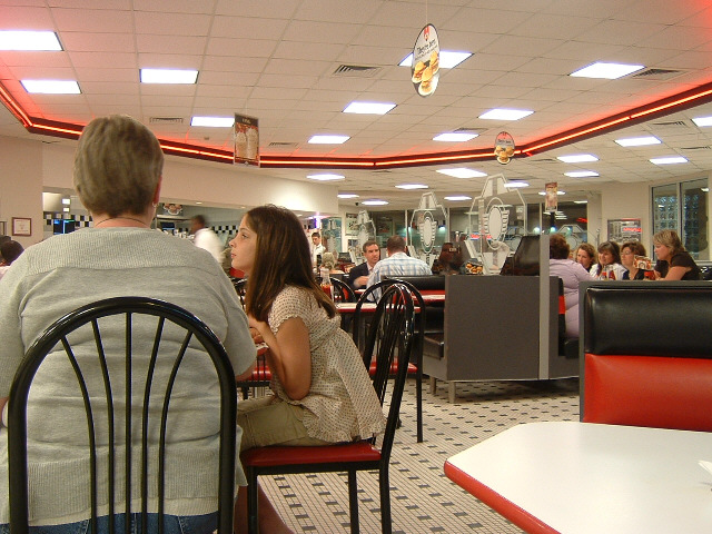 I feel like I've walked into somewhere from a film now. This is a place called Steak & Shake, of whi...