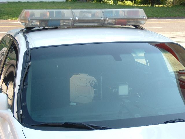 A police car parked outside a petrol station in Riverside, Missouri. I wonder what the Toughbook is ...