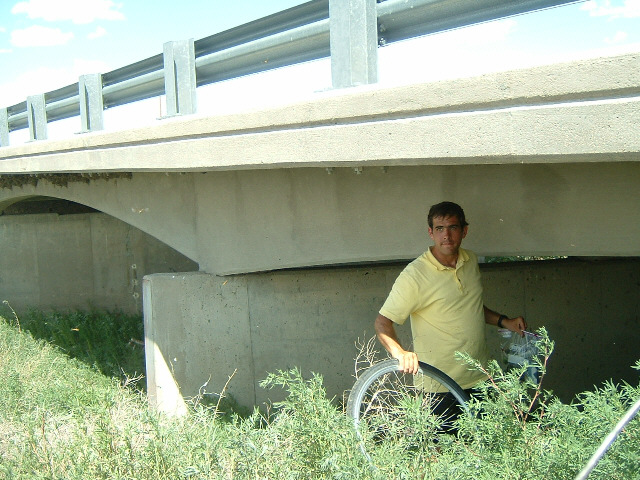 Finding a shady place to repair a puncture. The tyre needed topping up a couple of times after this ...