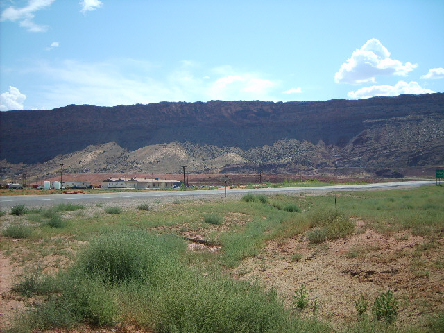 The flat pile of earth behind the buildings is the spoil tip from an old uranium mill. The authoriti...