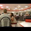 I feel like I've walked into somewhere from a film now. This is a place called Steak & Shake, of whi...