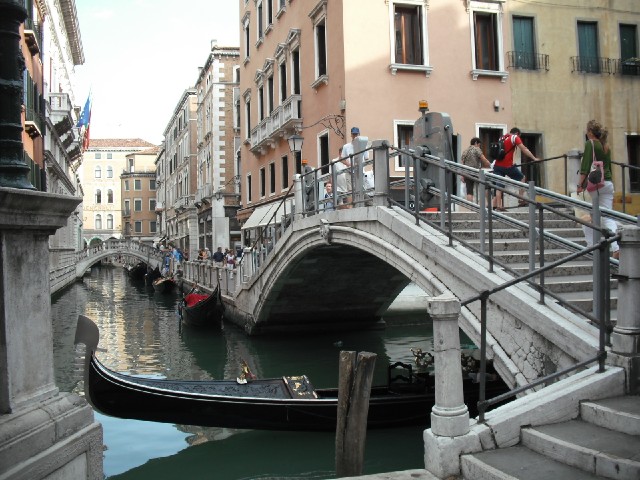 The bridge on the right has a pair of stairlifts running up it. I have seen a few people with pushch...