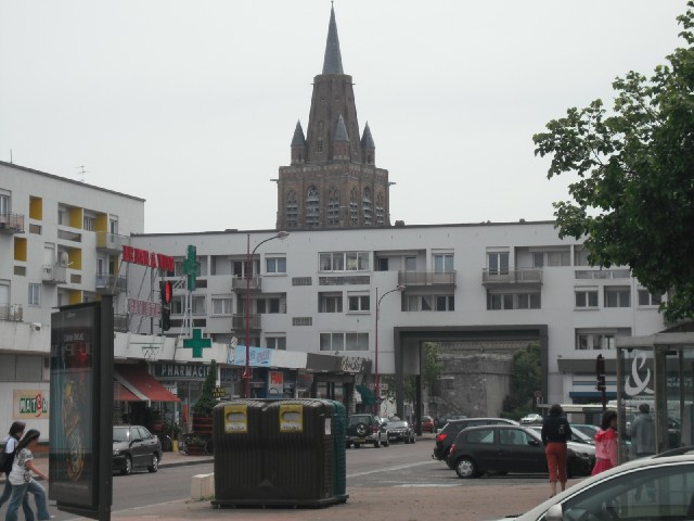 Calais, where there are buildings like that over almost all of the roads leading into this square, t...