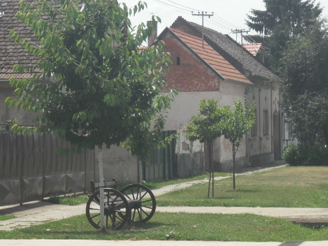 A lot of the houses have benches outside them. In Romania a few years ago, I saw saw people sitting ...