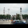 The main square in Vercelli. According to the inscription, the chap on the column is "Victor Em...