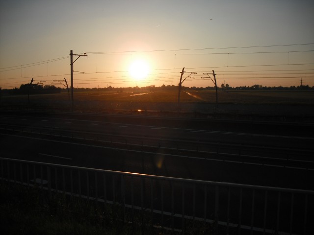 The flat scenery of Holland.<br><br>I think I will just about reach my hotel before the light goes.