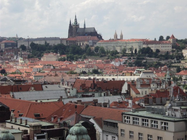 The whole of the raised area of buildings is Prague Castle. It's regarded as the largest ancient cas...