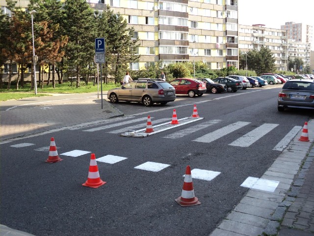 They're re-painting the zebra crossings in Pardubice this morning.