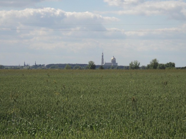 Wow! I've just crested a slight hill and this has appeared. It turns out that the Basilica of Our La...