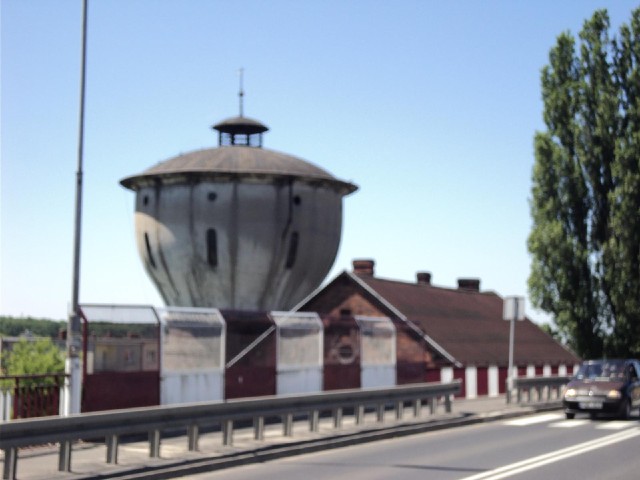 A close-up view of a water tower, slightly blurred, unfortunately.