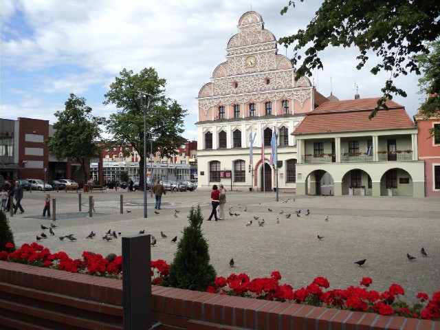 The main square. The old Town Hall is in the middle with the Guard House to the right of it. Under t...