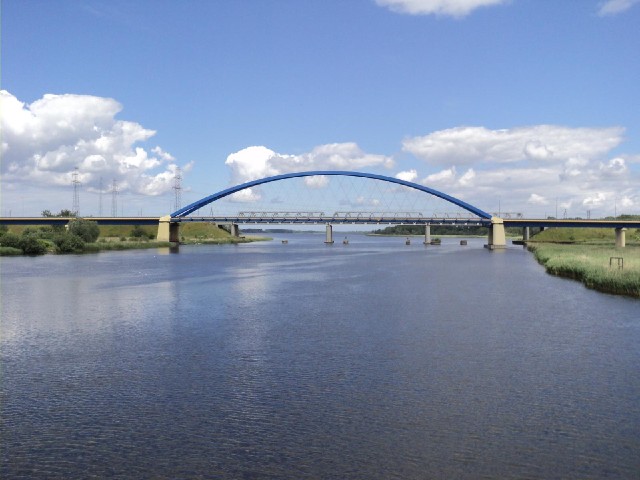 The new bridge at Wolin, seen from the old bridge. The water is one branch of the estuary of the riv...