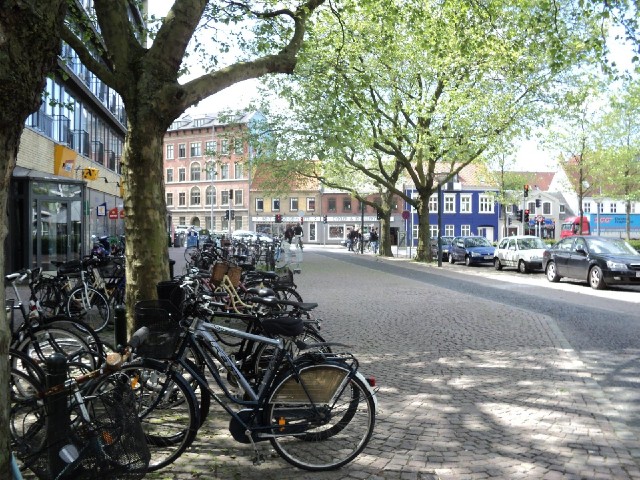 Lots of bikes in Odense. The building in the middle of the picture is one of many bike shops.
