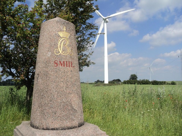 Milestone and wind turbine. Over the last few days, I've changed direction a few times, so I've avoi...