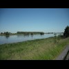 The Elbe, looking rather full. It's flowing quite fast too. In the middle is one of the many small f...