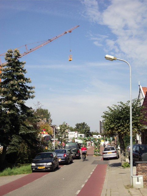 There was a fair in De Kwakel. The crane here is lifting people up to a great height so that they ca...