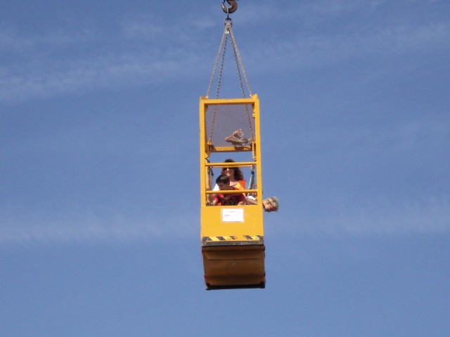 People using the crane.