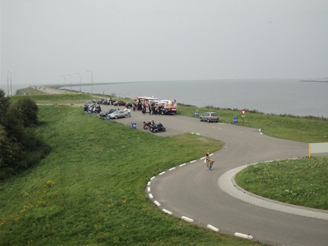 A last view of the dike, and somebody falling off a skateboard.