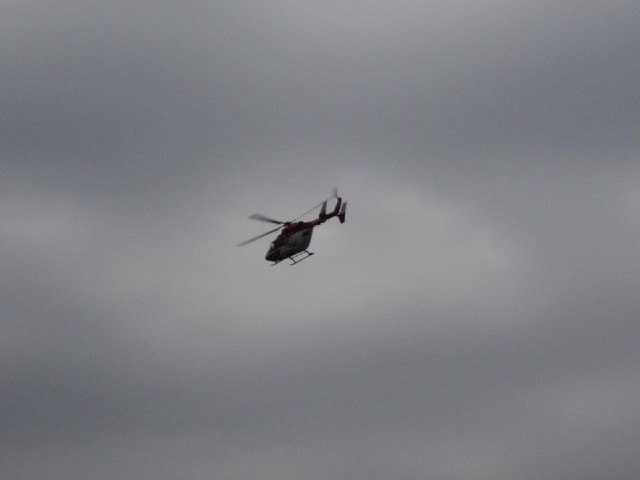 When this helicopter flew overhead along the road, I didn't associate it with the ambulance which ha...