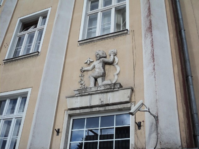 Above the door of a school.