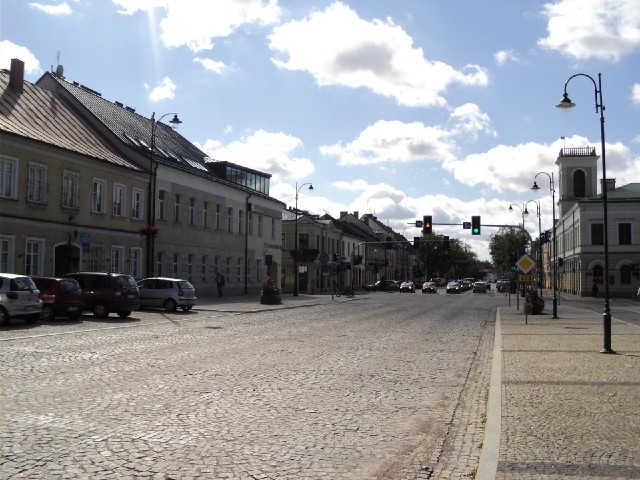 A broad cobbled street.
