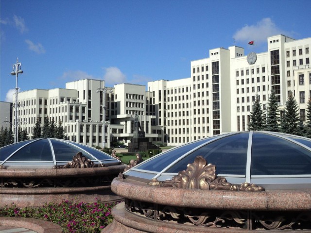 The Parliament Building with a Lenin statue in front of it. I don't know what the glass domes are fo...