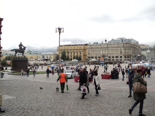 Manezhnaya Square, separated from Red Square by the museum.