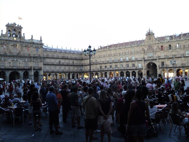 Salamanca's main square. The people in the stripey clothes on the right are giving some kind of musi...