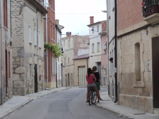 There were quite a few children on bikes in this village, although these two only seem to have one b...