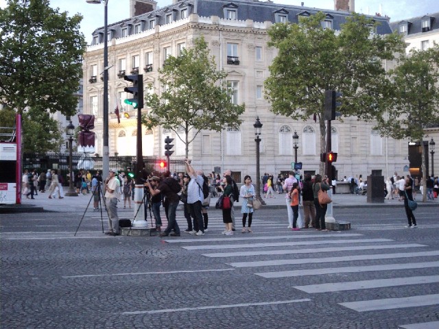 People photographing the Arc.