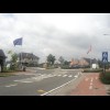 Roundabout art with flags.