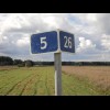 Road distance markers in Lithuania count both ways so you know how far it is to where you're coming ...