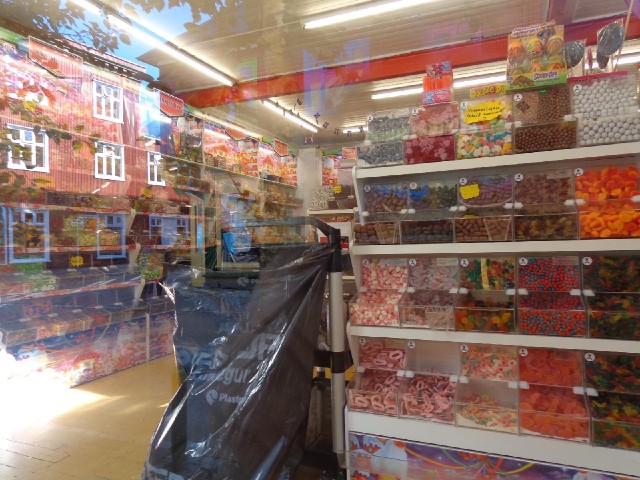 A sweet shop, seen through the window.